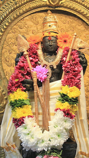 Lord Murugan Temple Idol Adorned With Colorful Flower Garlands And Golden Crown HD phone wallpaper