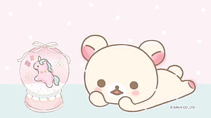 Korilakkuma Lying Down Next to a Pink Unicorn Snow Globe on a Soft Pastel Background HD wallpaper