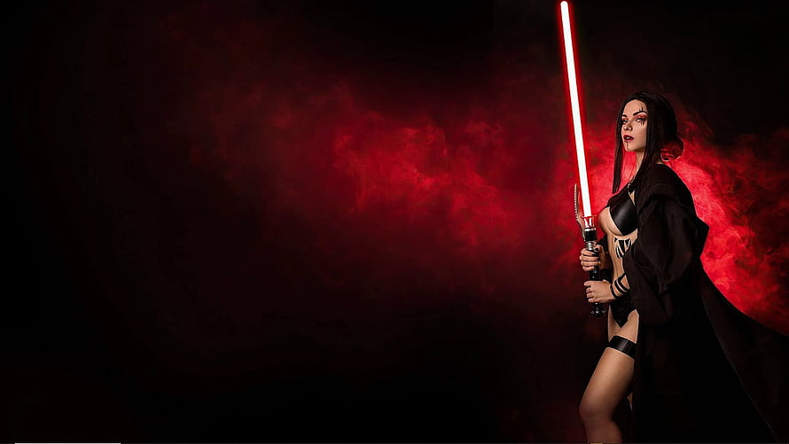 Female Sith Lord Cosplay with Red Lightsaber in Dark Smoky Atmosphere HD wallpaper