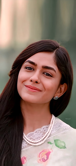Mrunal Thakur in Sita Ramam wearing a floral kurta and pearl necklace HD phone wallpaper
