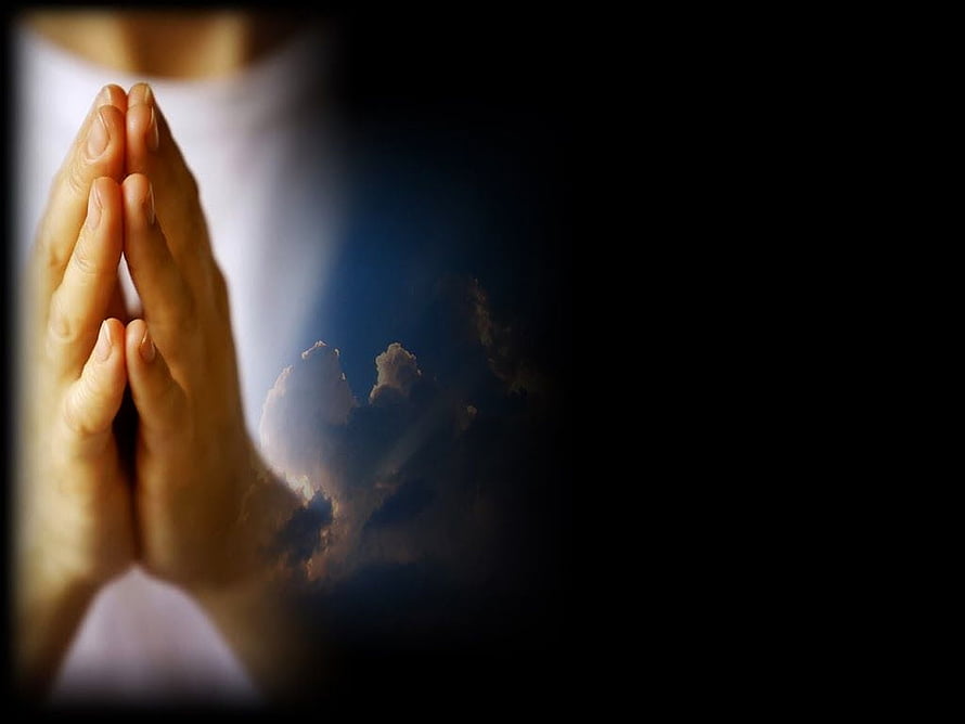 Praying Hands Against Dramatic Cloudy Sky with Warm Golden Light HD wallpaper