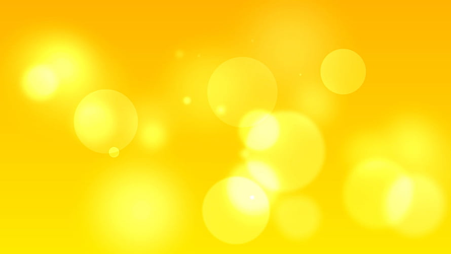 Vibrant Yellow Bokeh Light Orbs Abstract Background with Soft Glow and Warm Tones HD wallpaper