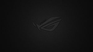 Subtle ASUS ROG Eye Logo on Dark Textured Background HD wallpaper