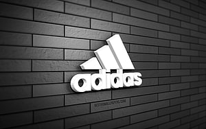 Adidas 3D Logo Mounted on Dark Gray Brick Wall with Minimalist Design HD wallpaper