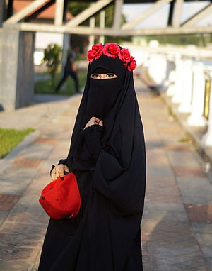Woman in Black Niqab with Red Floral Headpiece and Matching Bag HD phone wallpaper