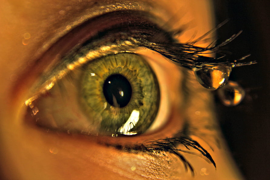 Extreme Macro Photography of a Green Human Eye with a Tear Droplet on the Eyelash HD wallpaper