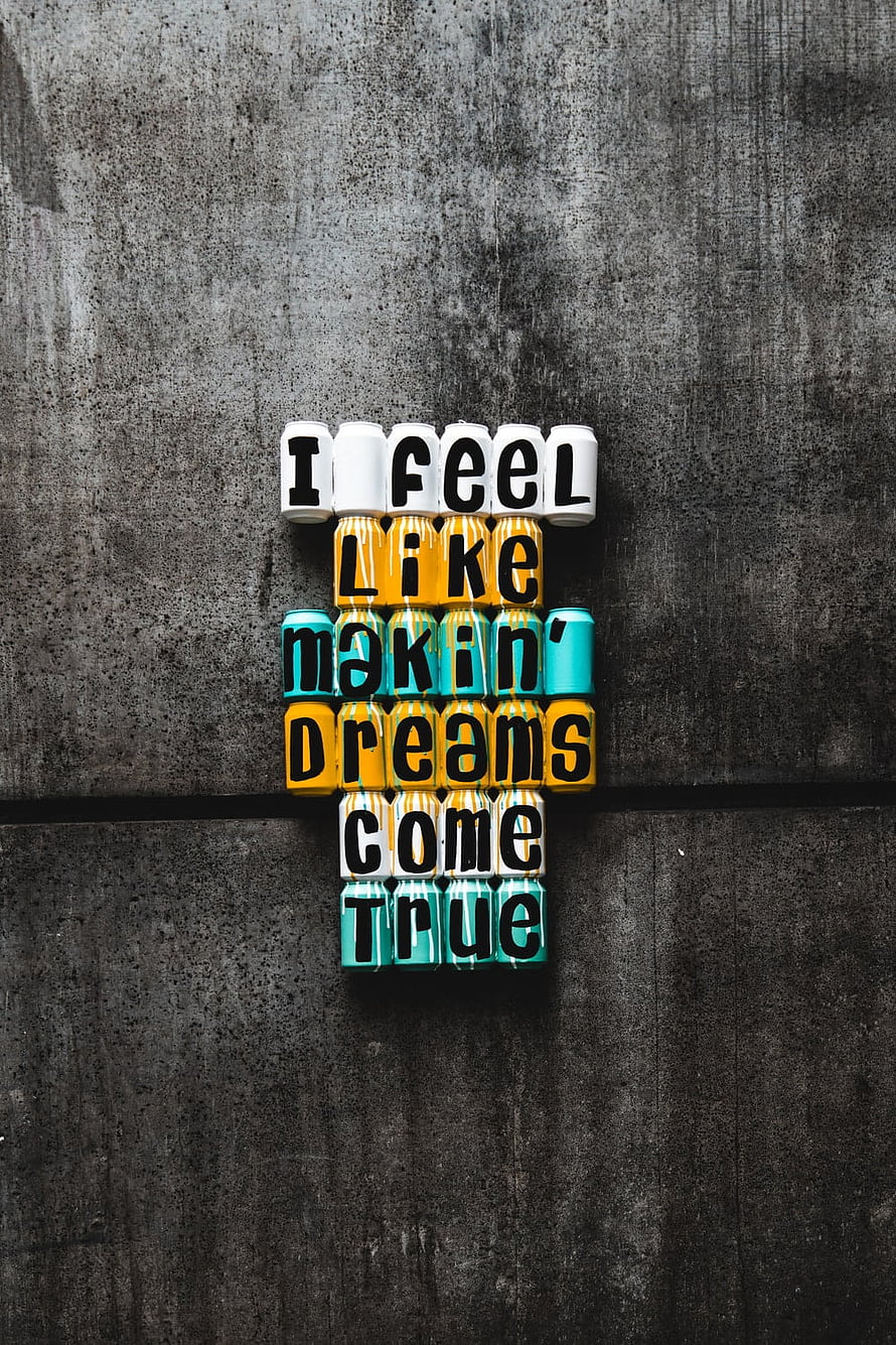 Motivational Quote Art Made From Painted Cans on Concrete Wall HD phone wallpaper