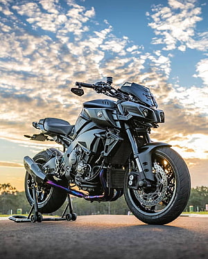 Yamaha MT-10 Matte Black Motorcycle on Stand at Sunset HD phone wallpaper