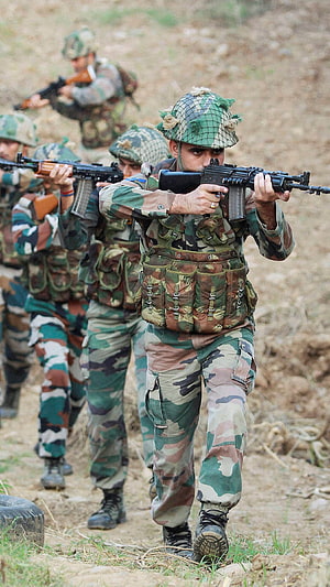 Indian Army soldiers in camouflage gear advancing with rifles during a field training exercise HD phone wallpaper