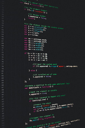 Dark Mode JavaScript Source Code Displayed on a Computer Monitor Screen HD phone wallpaper
