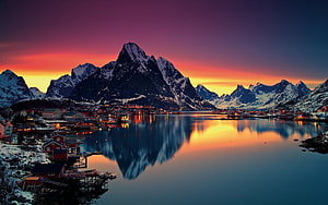 Reine Village in the Lofoten Islands at Sunset with Snow-Capped Mountains and Fjord Reflections HD wallpaper