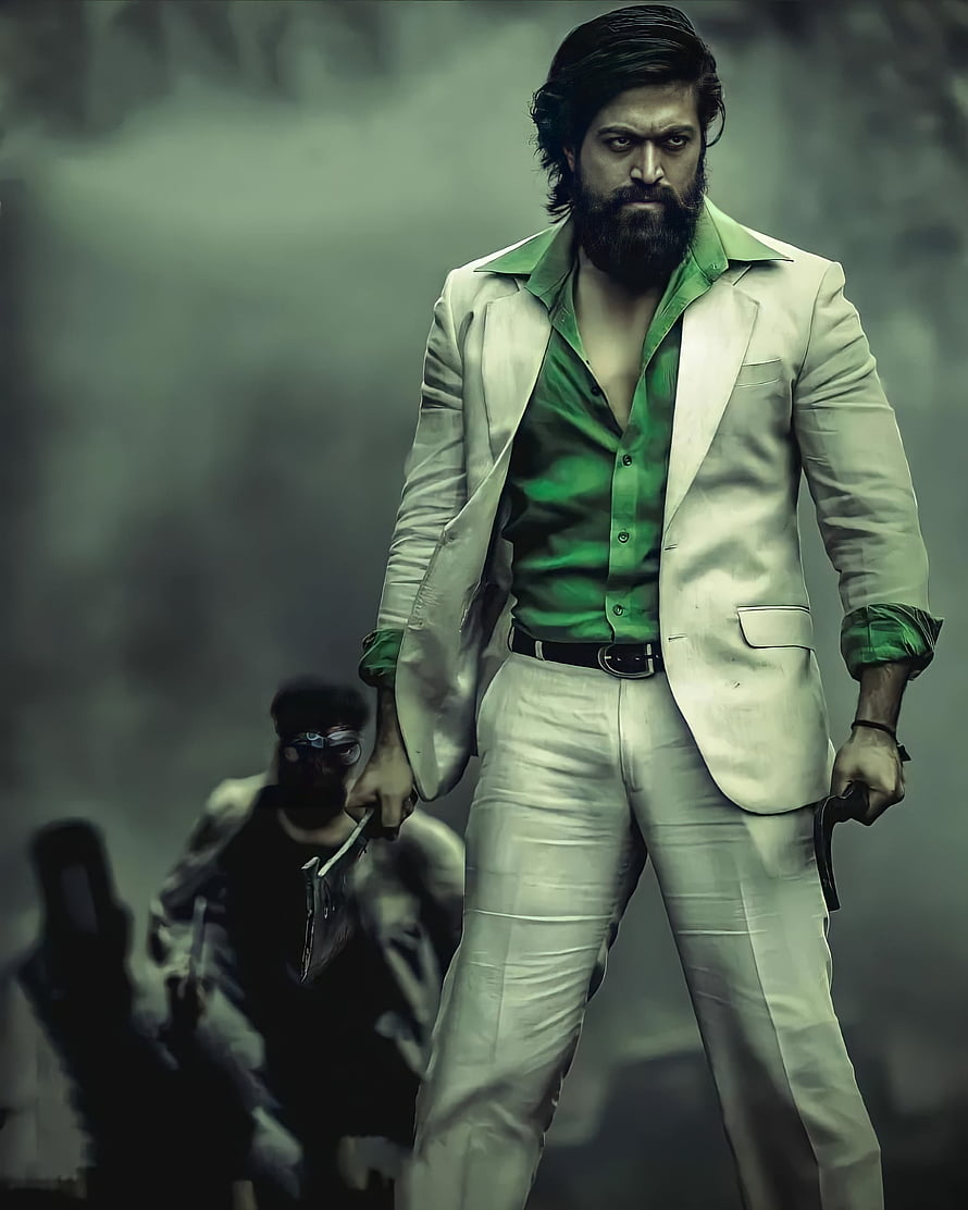 Yash as Rocky in KGF Chapter 2, menacing white suit and green shirt with pistol in smoky setting HD phone wallpaper
