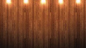 Warm Wooden Wall Paneling with Soft Overhead Lighting and Rich Grain Texture HD wallpaper