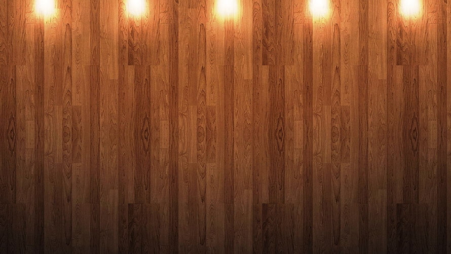 Warm Wooden Wall Paneling with Soft Overhead Lighting and Rich Grain Texture HD wallpaper
