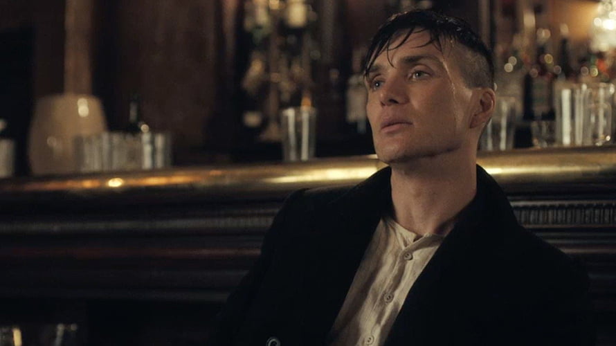 Thomas Shelby in a dimly lit bar from the Peaky Blinders series HD wallpaper
