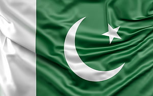 Pakistan National Flag with Crescent and Star on Waving Green and White Fabric HD wallpaper