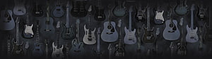 Dark Wall of Electric and Acoustic Guitars in Monochrome HD wallpaper