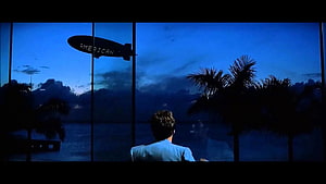 Scarface The World Is Yours Movie Scene with Blimp and Palm Trees at Dusk HD wallpaper
