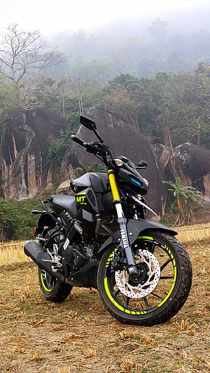 Yamaha MT-15 Motorcycle Parked in Misty Mountain Landscape with Neon Green Accents HD phone wallpaper