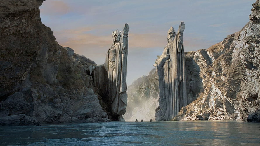 The Two Kings of Gondor Statues at the Mouth of the Anduin River HD wallpaper