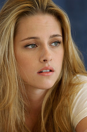 Kristen Stewart Close-Up Portrait with Long Blonde Hair and Soft Natural Lighting HD phone wallpaper