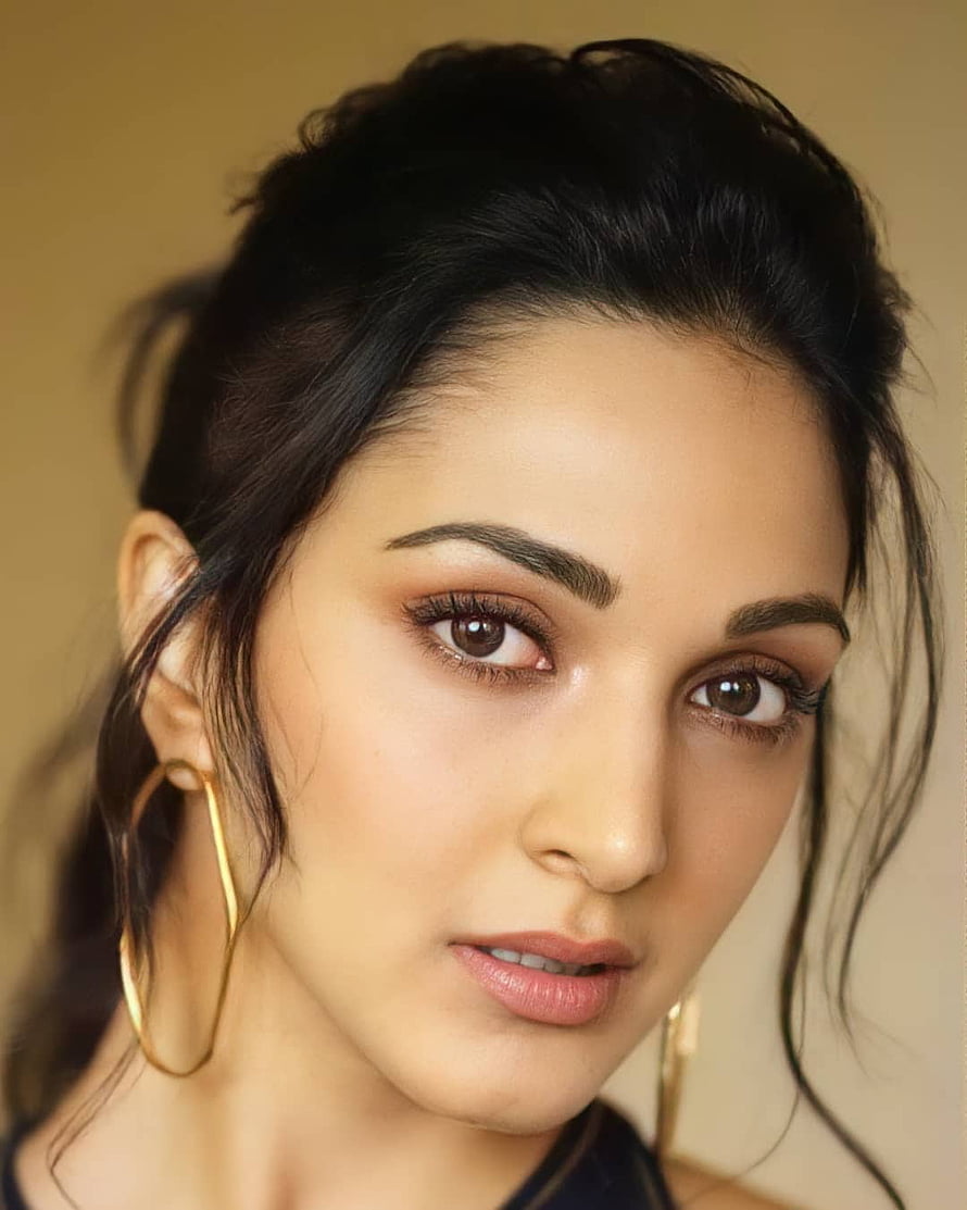 Kiara Advani Close-Up Portrait With Gold Hoop Earrings And Soft Makeup HD phone wallpaper