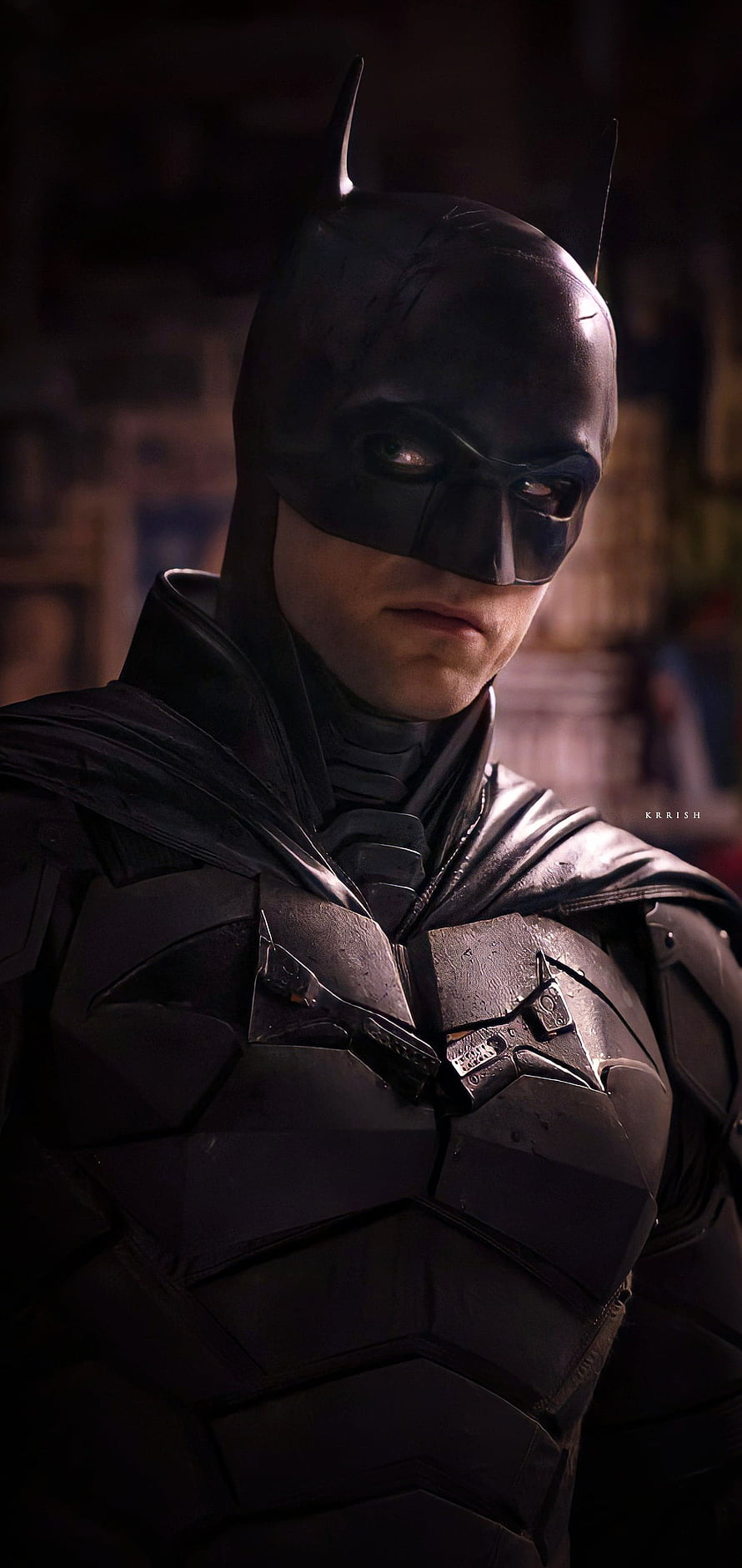 Robert Pattinson as Batman in Dark Tactical Armor with Intense Gaze HD phone wallpaper