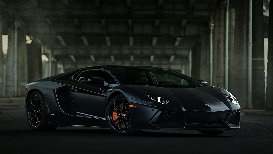 Matte Black Lamborghini Aventador LP700-4 in a Dark Industrial Concrete Tunnel HD wallpaper