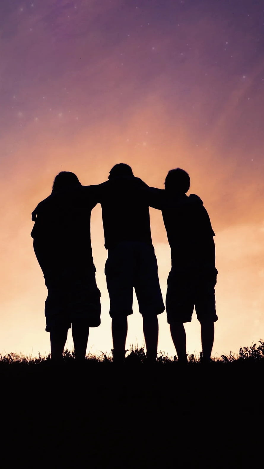 Three friends standing together in silhouette against a vibrant sunset sky HD phone wallpaper