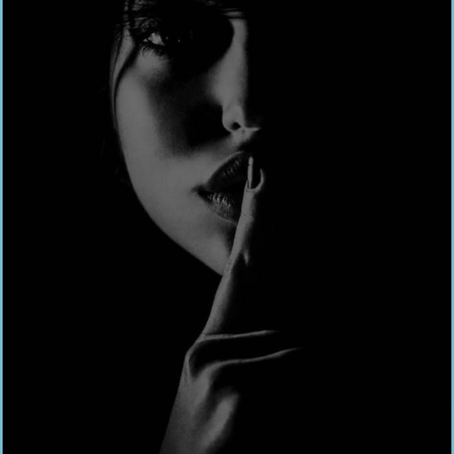 Moody Black and White Portrait of a Woman with Finger to Lips in Shadow HD phone wallpaper