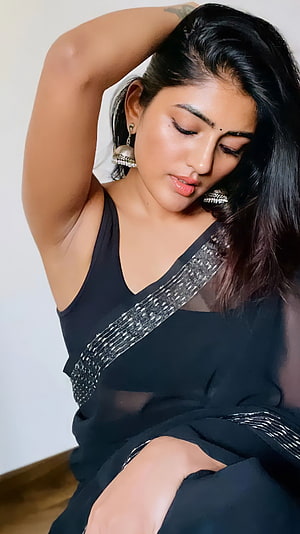 Eesha Rebba in a Black Embroidered Saree with Traditional Jhumka Earrings HD phone wallpaper