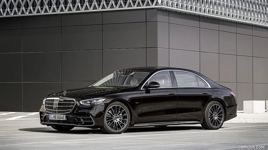 Black Mercedes-Benz S-Class Sedan Parked Against Modern Architectural Facade HD wallpaper