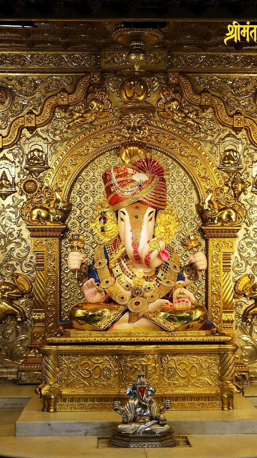 Dagdusheth Ganpati Murti in Ornate Golden Temple Setting HD phone wallpaper