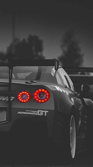 Nissan GT-R R35 Rear View with Red LED Taillights and ADVAN Racing GT Wheels HD phone wallpaper