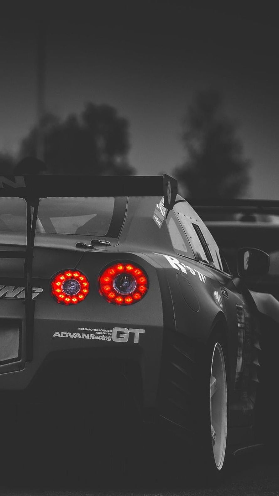 Nissan GT-R R35 Rear View with Red LED Taillights and ADVAN Racing GT Wheels HD phone wallpaper