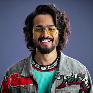 Bhuvan Bam Portrait in Embroidered Denim Jacket and Yellow Tinted Aviator Sunglasses HD phone wallpaper