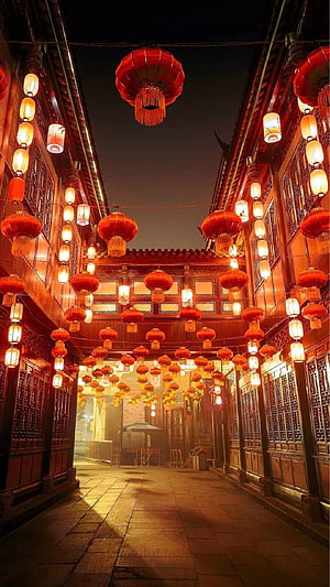 Traditional Chinese Street Lined With Red Lanterns At Night HD phone wallpaper
