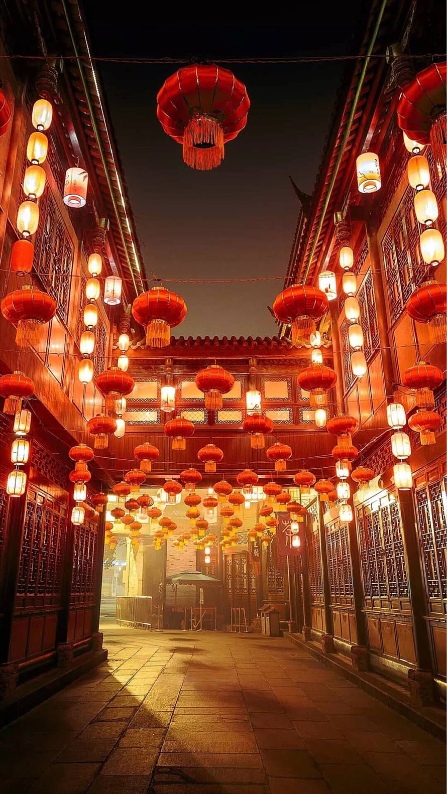 Traditional Chinese Street Lined With Red Lanterns At Night HD phone wallpaper