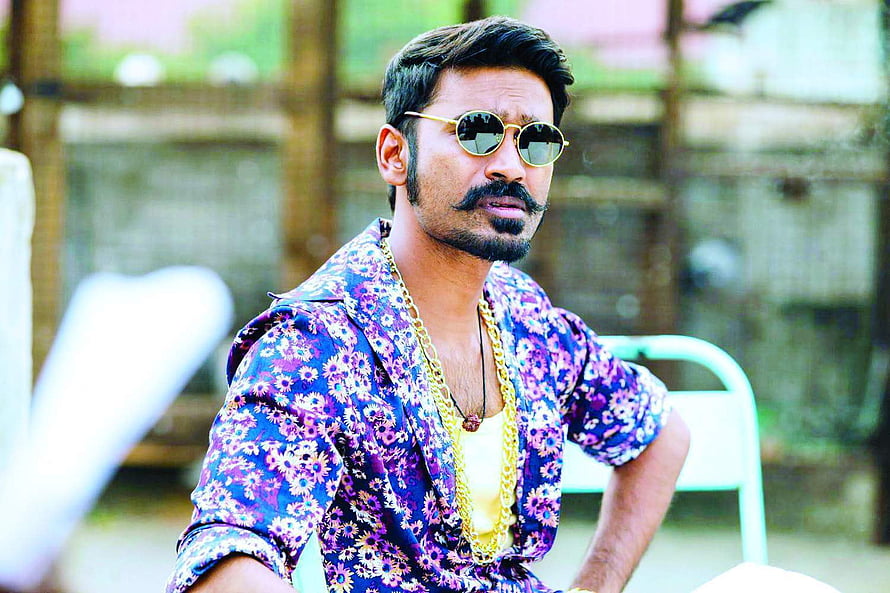 Dhanush in Maari 2 wearing round sunglasses and a vibrant floral shirt HD wallpaper