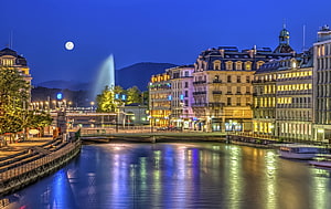 Geneva Switzerland Night Skyline With Full Moon And River Reflections HD wallpaper