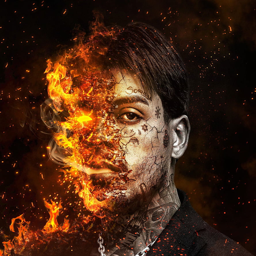 MC Kevin Fênix: Dramatic Portrait of a Tattooed Man with Burning Fire Effects HD phone wallpaper