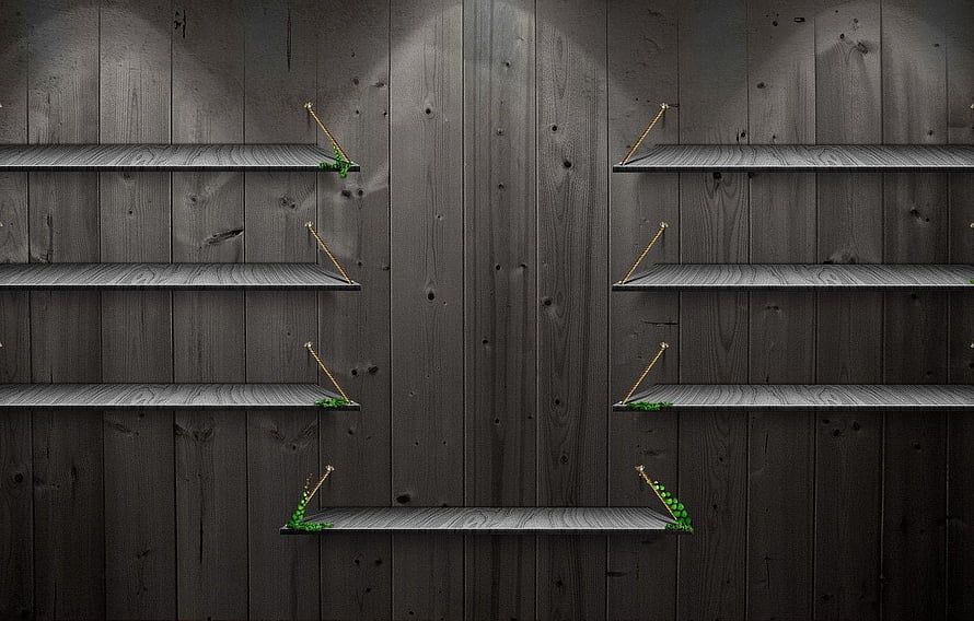 Dark rustic wooden wall with empty floating shelves and green ivy accents HD wallpaper