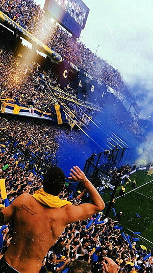 Boca Juniors Ultras Celebrating in the Stadium with Blue and Yellow Flags HD phone wallpaper