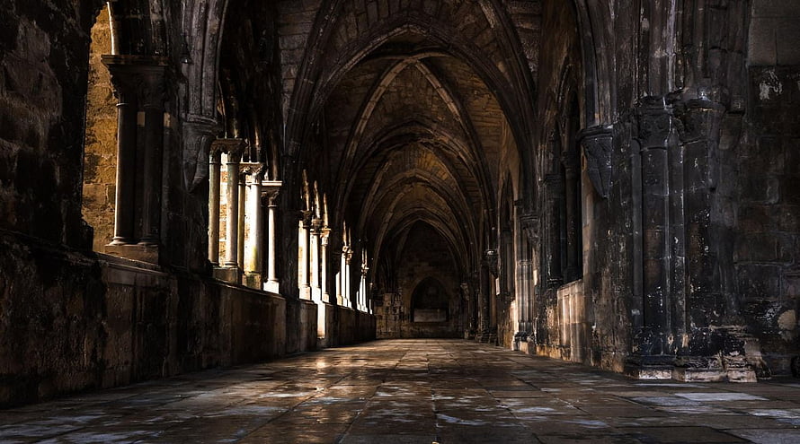 Sunlit Gothic Cathedral Interior with Arched Stone Vaulting and Ancient Columns HD wallpaper