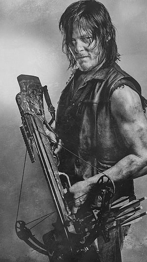 Daryl Dixon from The Walking Dead holding a crossbow in a gritty black and white portrait HD phone wallpaper
