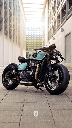 Mint Green Triumph Bobber Custom Motorcycle Parked in Urban Alleyway HD phone wallpaper
