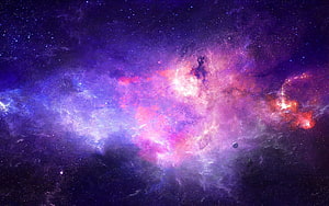 Vibrant Purple and Pink Nebula Clouds in Deep Space with Scattered Stars HD wallpaper