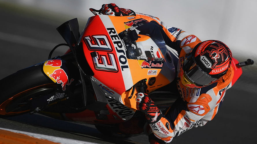 Marc Marquez on Repsol Honda RC213V Racing Motorcycle During High-Speed Track Corner HD wallpaper