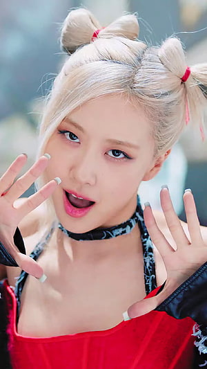 Rose from BLACKPINK in Pink Venom MV with blonde space buns and red outfit HD phone wallpaper