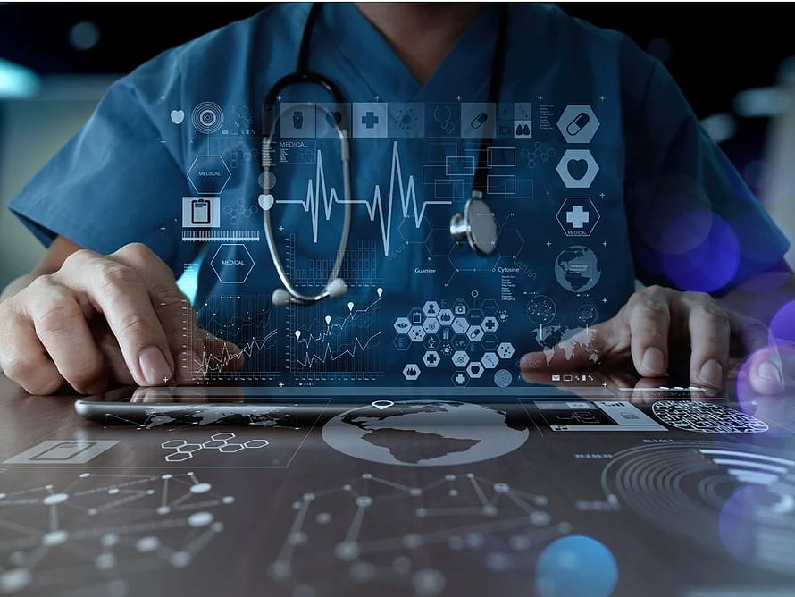 Doctor in Blue Scrubs Using Tablet with Medical Data and Stethoscope HD wallpaper